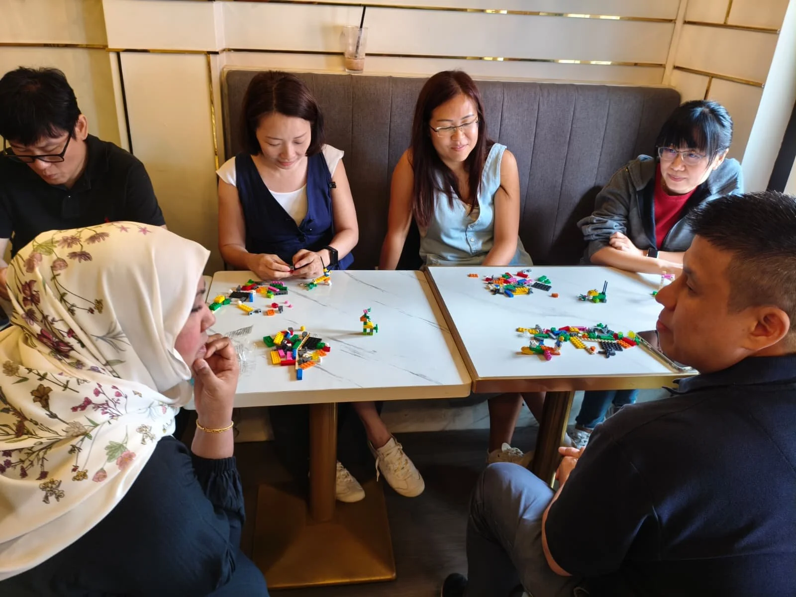 Aishah facilitating a LEGO Serious Play workshop